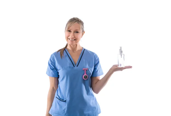 Sköterska Med Handdesinfektionsmedel Eller Annan Produkt Handflatan — Stockfoto
