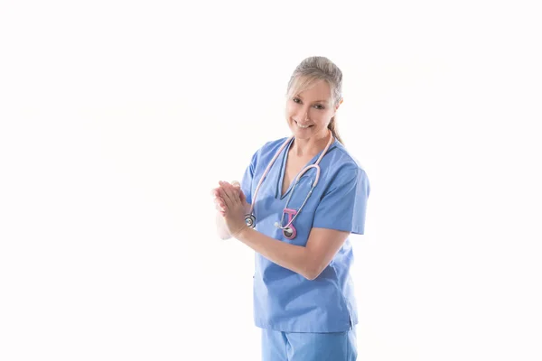 Friendly Nurse Using Alcohol Hand Sanitizer — Stock Photo, Image