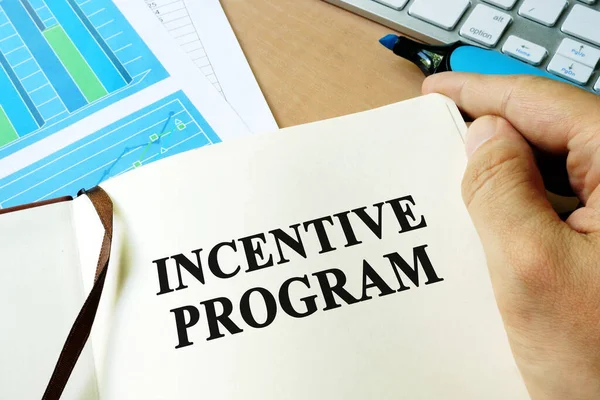 Hands Holding Book Title Incentive Program — Stock Fotó