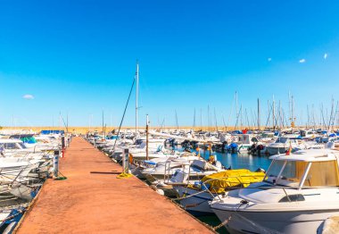 Beautiful luxury yachts and motor boats anchored in the harbor