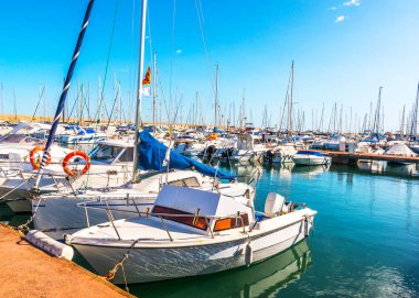 Beautiful luxury yachts and motor boats anchored in the harbor