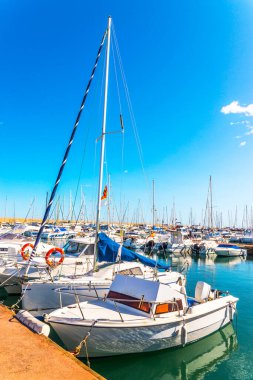 Beautiful luxury yachts and motor boats anchored in the harbor