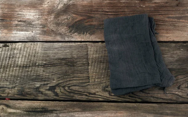 Toalha Têxtil Cozinha Preta Dobrada Uma Mesa Madeira Cinza — Fotografia de Stock