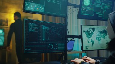 Masked hacker stealing online information from people