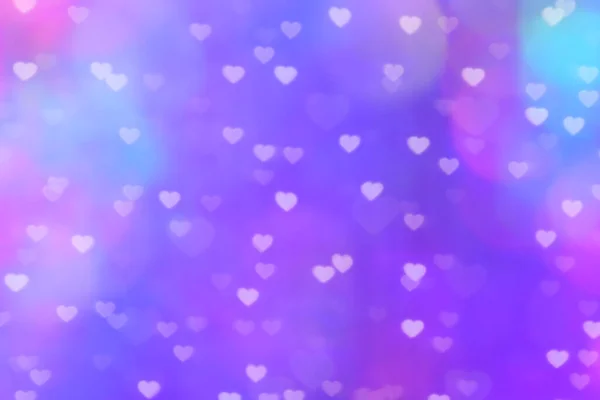 模糊的心形灯紫罗兰色的背景 五彩斑斓的心形灯柔和的墙纸 闪耀的心形灯明亮的心形情人节浪漫的背景 — 图库照片