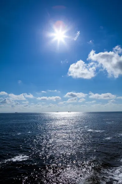 sun on the sea, blue sea and clouds, summer vacation
