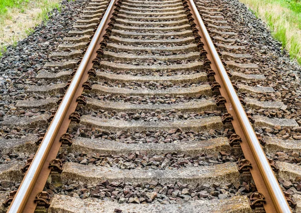 stock image Multiple railroad tracks with junctions at a railway station 