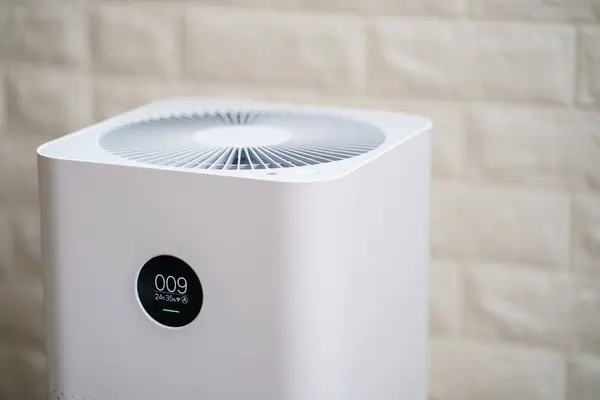 Closeup of  Air purifier with monitor screen, show air quality