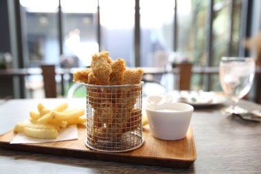 fried chicken wings in a restaurant.