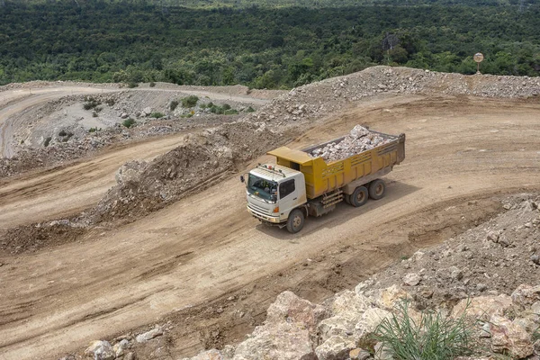 Dumper truck carrying rocks in a quarry