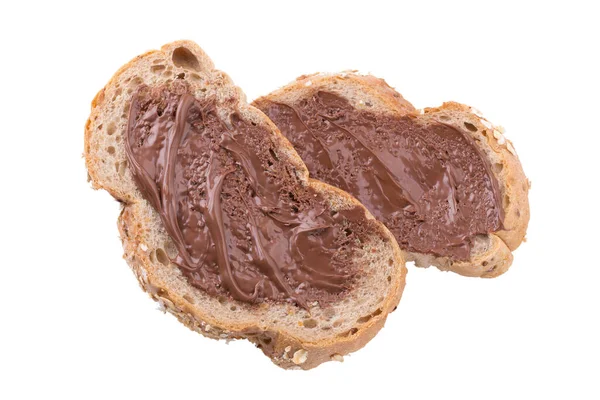涂在褐色全麦面包片上的巧克力奶油 — 图库照片