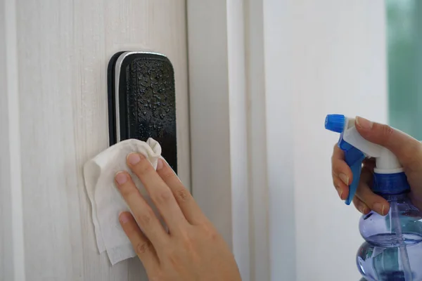 Woman Hand Using Napkin Detergent Spray Cleaning Doorknob — Stock Photo, Image