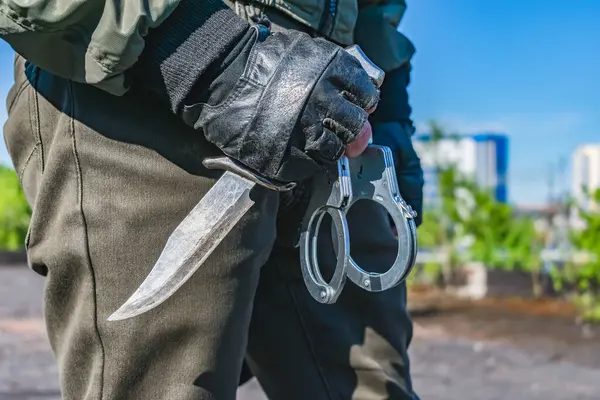 Arrest Police Protesters Commando Holds Handcuffs Knife Ready — Stock Photo, Image
