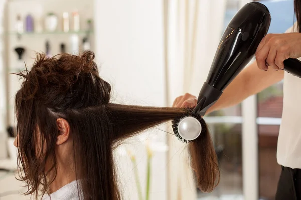 Hair drying and shaping  in hair salon