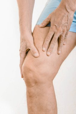 Athlete man feeling pain to the quadriceps