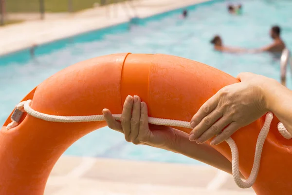Womans Hands Holding Lifesaver Float — Stock Photo, Image