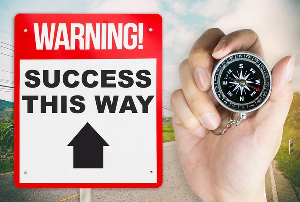 Holding Compass Way Success Warning Concept Signage — Stockfoto