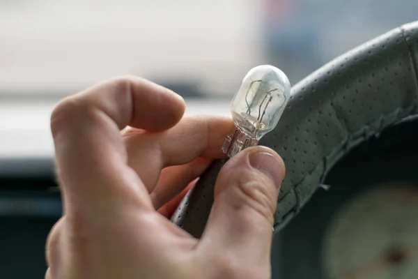 Fingers Human Hand Hold Damaged Light Bulb Car — Stok fotoğraf