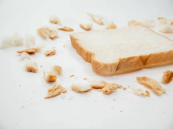 Scattered Bread Crumbs Sliced Bread White Table Background — Stock Photo, Image