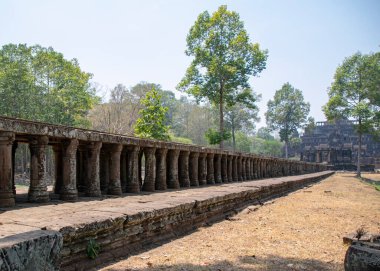 A stone causeway supported by many finely carved columns