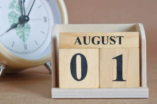 stock image wooden calendar with month of August, planning concept