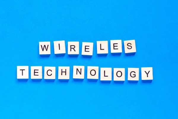 Words Wireless Technology Spelt Wooden Letter Tiles White Background Wireless — Stock Photo, Image