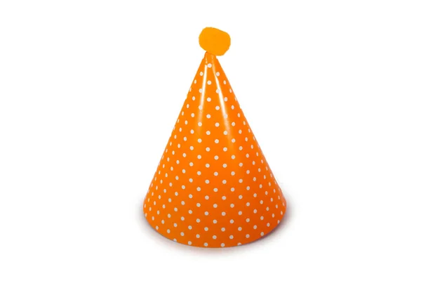 純白の背景にオレンジの誕生日帽子 — ストック写真