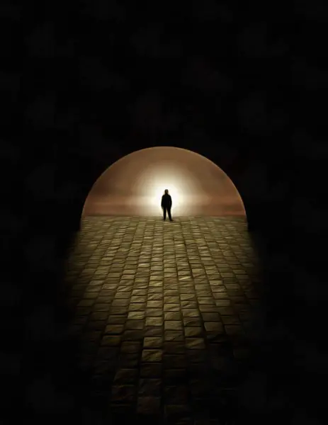 man walking on the street in dark