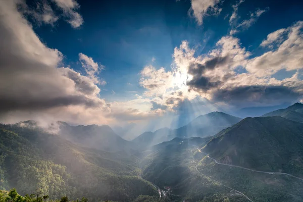 The magical sunset on O Quy Ho mountain pass before sunset. O Quy Ho Mountain Pass in Sapa, Vietnam is Vietnam longest mountain pass.