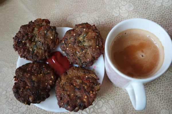 Delicious Spicy Fried Kebab Served White Plate Cup Hot Tea — ストック写真