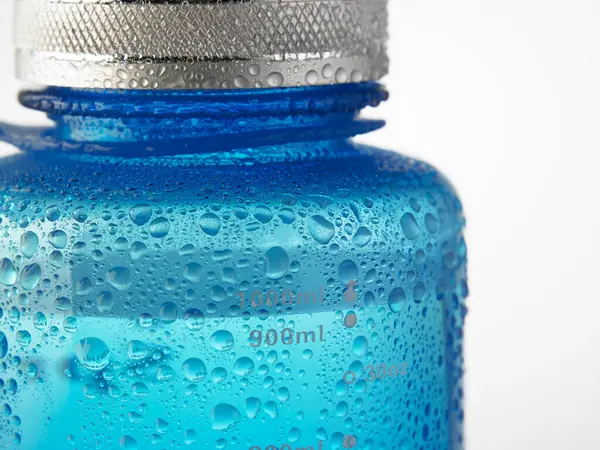 Blue Water Bottle Small Drops Surface — Stock Photo, Image