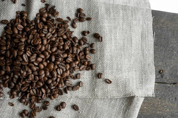 Bruna Rostade Kaffebönor Och Canva Textil Kopiera Utrymme — Stockfoto