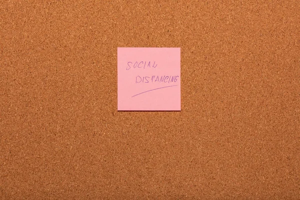 Reminder Social Distancing Handwritten Pink Sticker Cork Notice Board — Stock Photo, Image