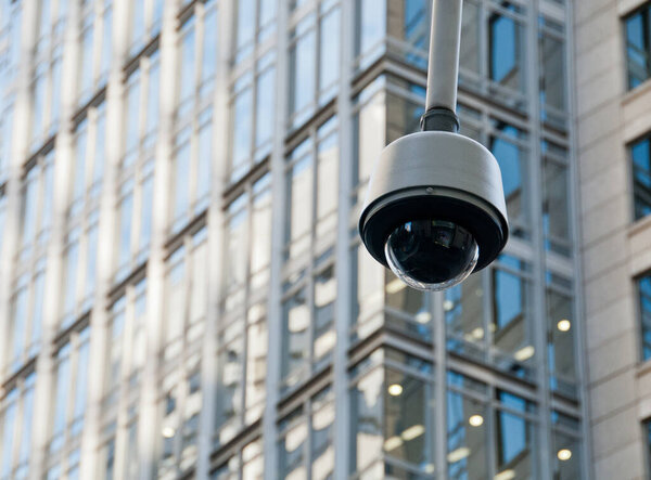 CCTV surveillance security dome camera in city center