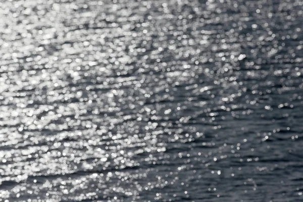 Kleiner Funkelnder Weißer Bokeh Vom Licht Das Vom See Abprallt — Stockfoto