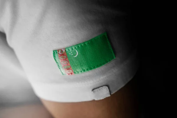 Aufnäher Der Nationalflagge Turkmenistans Auf Einem Weißen Shirt — Stockfoto