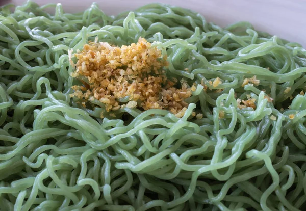 Green noodles close-up view