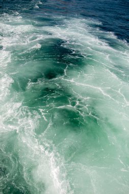 Köpük ve kabarcıklar ile su yüzey arka plan