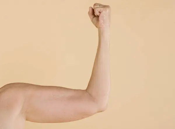 Young Man Showing Strength Biceps Muscles — Stock Photo, Image
