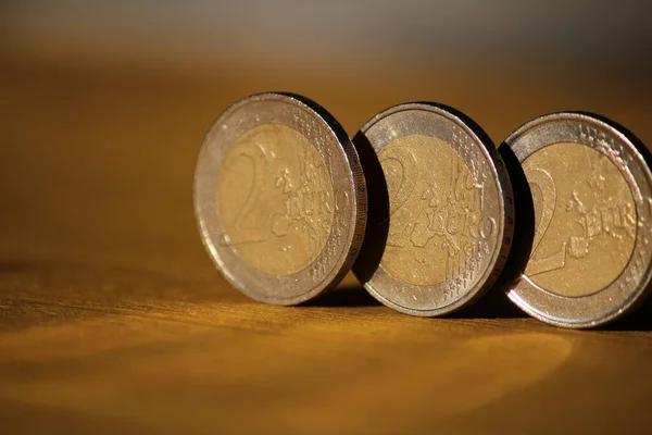 Three Euro Coins Wooden Board — Stock Photo, Image
