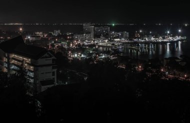 Laem Thaen with top view on Khao Sam Muk Mountain at night view of chonburi, Beautiful Khao Sam Muk view point twilight.