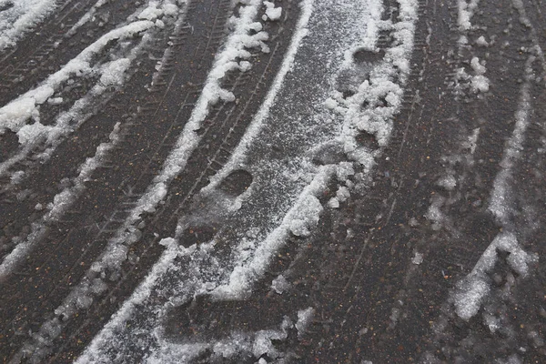 Tire Tracks Melting Snow Asphalt Road — Stock Photo, Image