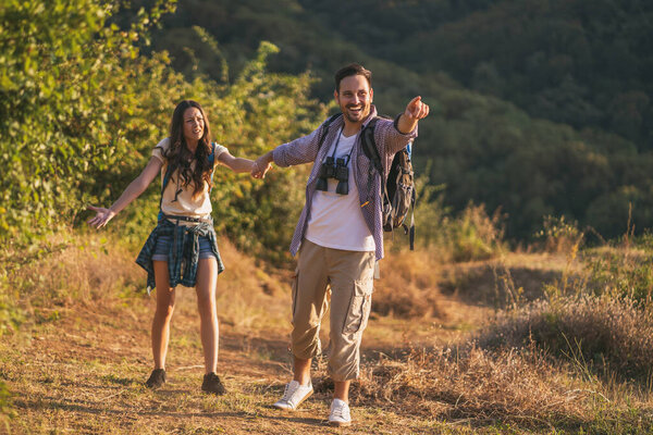 young couple hiking together