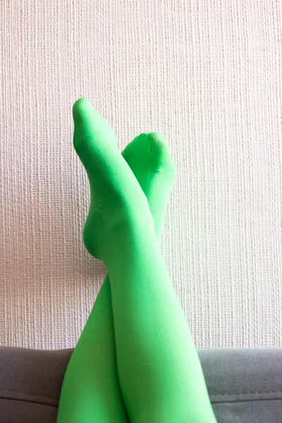 Legs Green Pantyhose Resting Wall Sofa — Stock Photo, Image