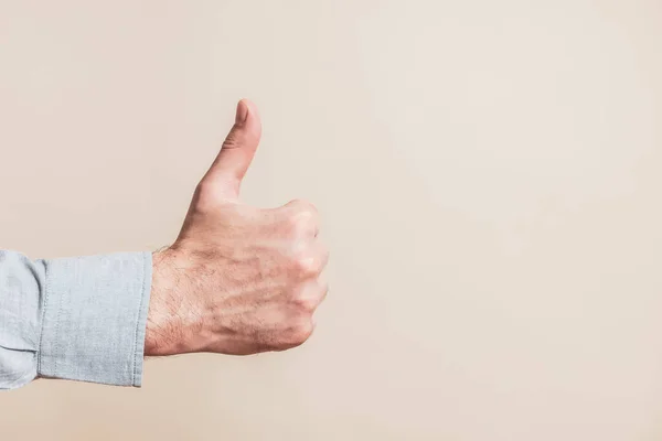 Male Hand Showing Thumb Beige Background — Stock Photo, Image