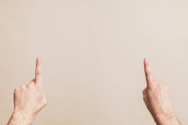 Male Hands Pointing Beige Background — Stok fotoğraf