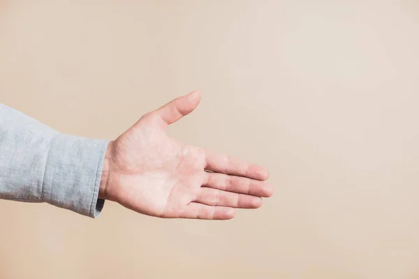 Male Hand Showing Handshaking Gesture Beige Background — Stok fotoğraf