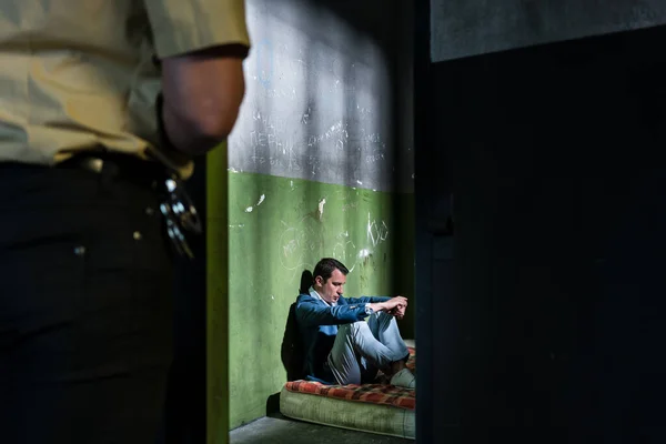 Young Male Prisoner Sitting Alone Obsolete Prison Cell Guard — Stock Photo, Image