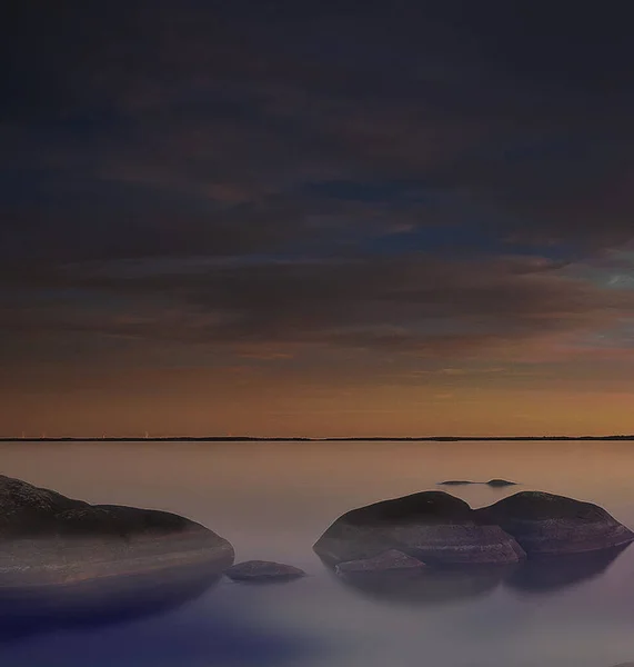 Picturesque rocky seaside scenery at sunset, Sweden