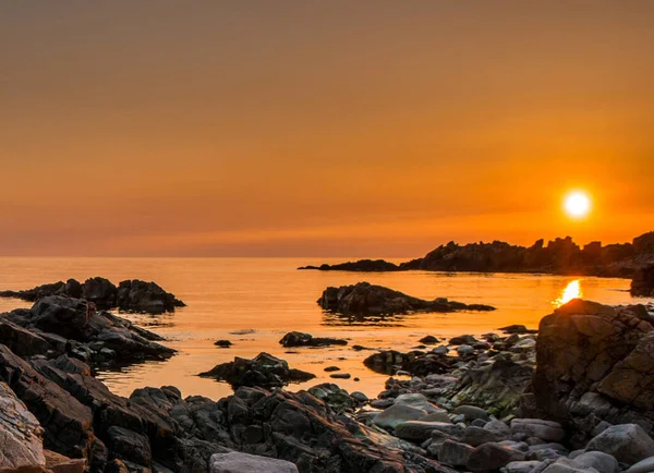 Picturesque rocky seaside scenery at sunset, Sweden